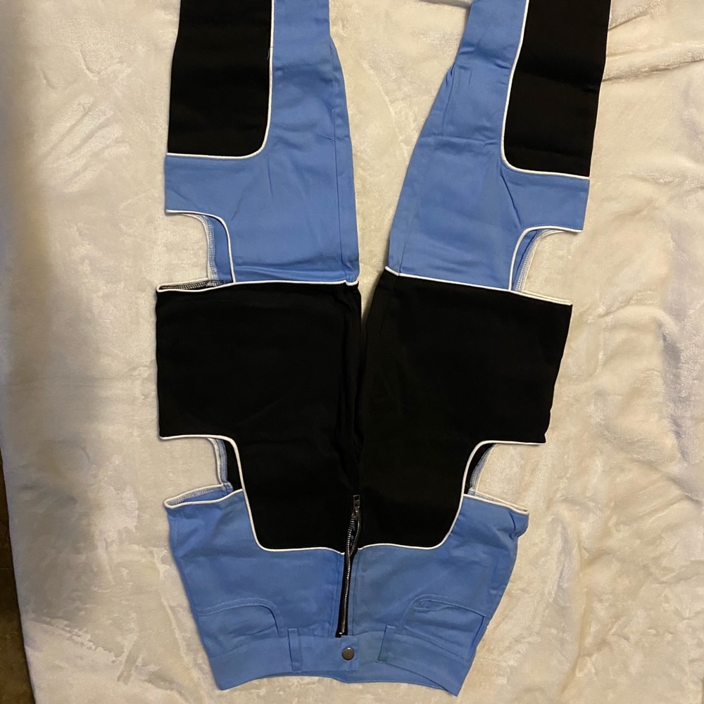 High waisted pants with sides cut out. Small